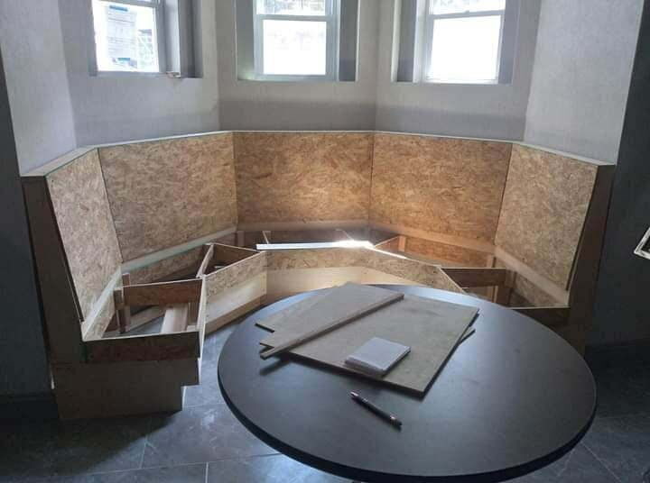 Curved banquette frame built to fit a bay window, before foam and cover